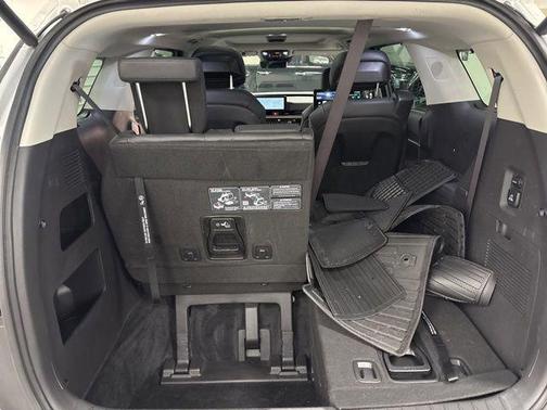 Ivory Silver 2025 Kia Carnival Hybrid SX Prestige