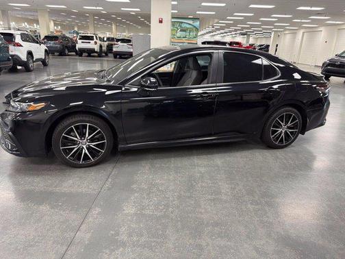 Midnight Black Metallic 2024 Toyota Camry Hybrid SE