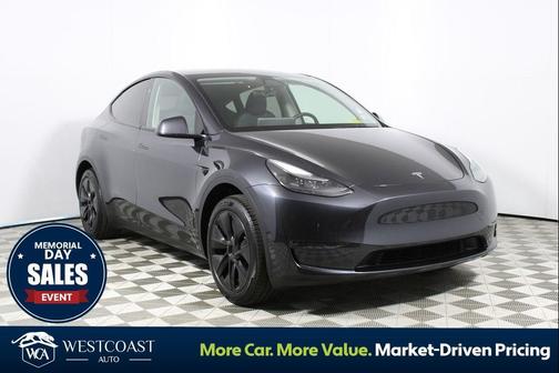 Solid Black 2025 Tesla Model Y Long Range Dual Motor Rear-Wheel Drive