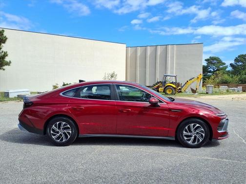 Ultimate red 2026 Hyundai SONATA Hybrid Base
