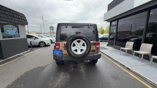 Copper Brown Pearlcoat 2015 Jeep Wrangler Unlimited Sport