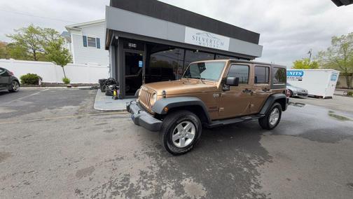 Copper Brown Pearlcoat 2015 Jeep Wrangler Unlimited Sport