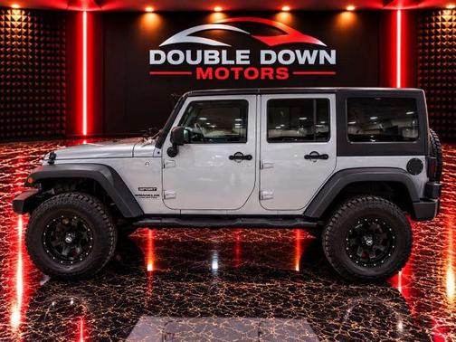 Silver 2015 Jeep Wrangler Unlimited Sport