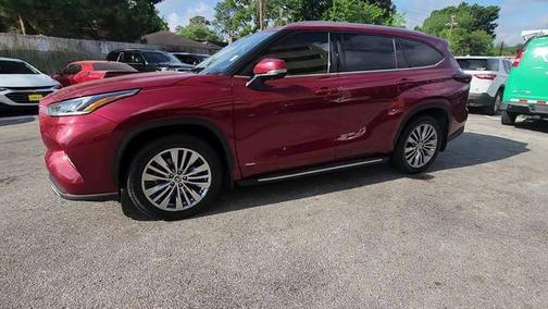 Red 2024 Toyota Highlander Hybrid Platinum