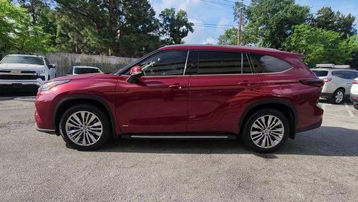 Red 2024 Toyota Highlander Hybrid Platinum