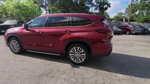 Red 2024 Toyota Highlander Hybrid Platinum