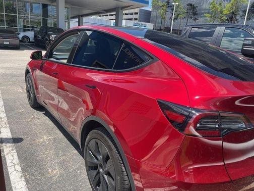 Red 2025 Tesla Model Y Long Range
