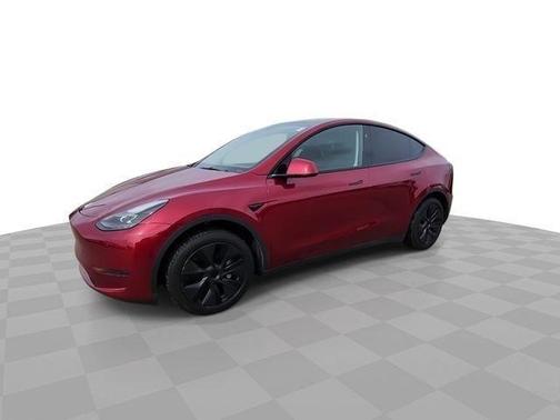 Red 2025 Tesla Model Y Long Range