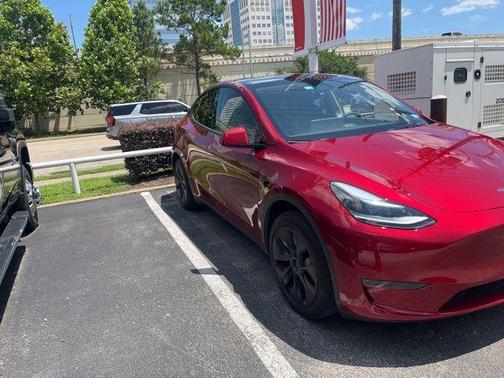 Red 2025 Tesla Model Y Long Range