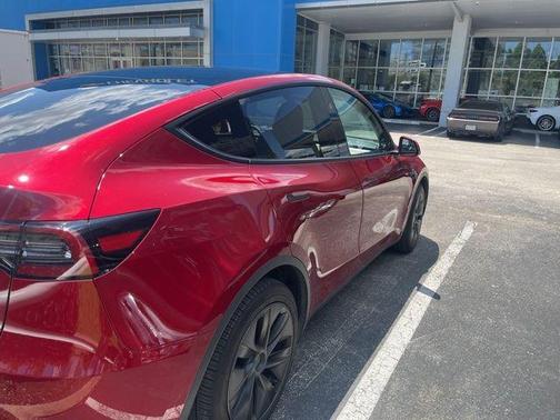Red 2025 Tesla Model Y Long Range
