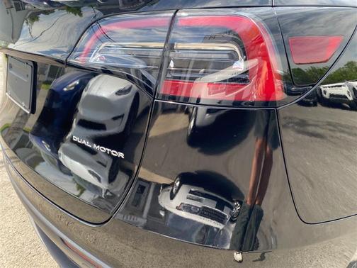 Solid Black 2025 Tesla Model Y Long Range Dual Motor All-Wheel Drive