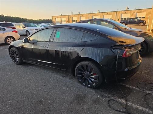 Solid Black 2023 Tesla Model 3 Performance