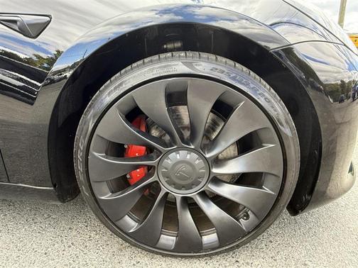 Solid Black 2023 Tesla Model 3 Performance