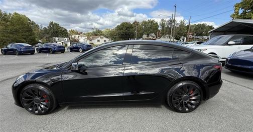 Solid Black 2023 Tesla Model 3 Performance