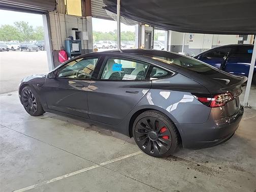 Solid Black 2023 Tesla Model 3 Performance