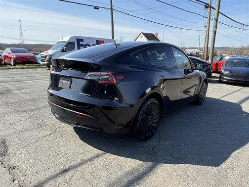 Solid Black 2024 Tesla Model Y Long Range Dual Motor All-Wheel Drive