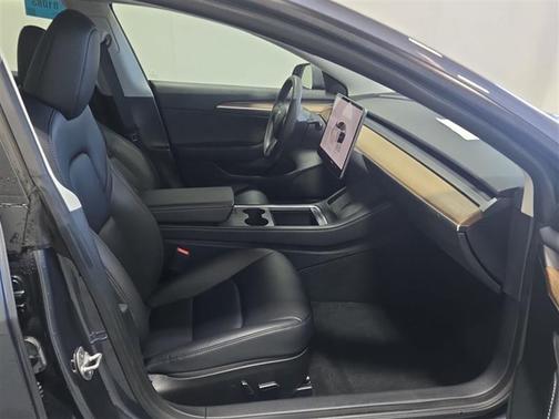 Solid Black 2023 Tesla Model 3 Standard Range Plus