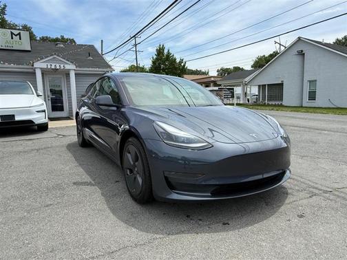 Solid Black 2023 Tesla Model 3 Standard Range Plus