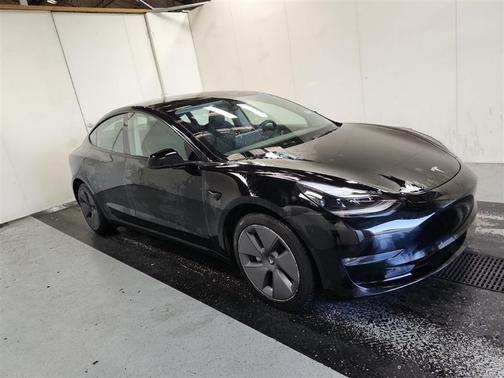 Solid Black 2023 Tesla Model 3 Standard Range Plus