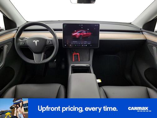 Red 2024 Tesla Model Y Long Range