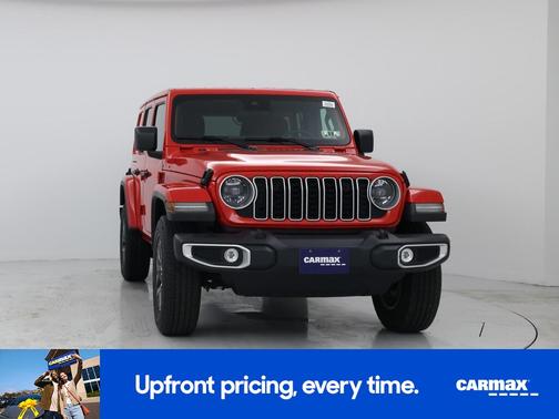 Red 2025 Jeep Wrangler Sahara