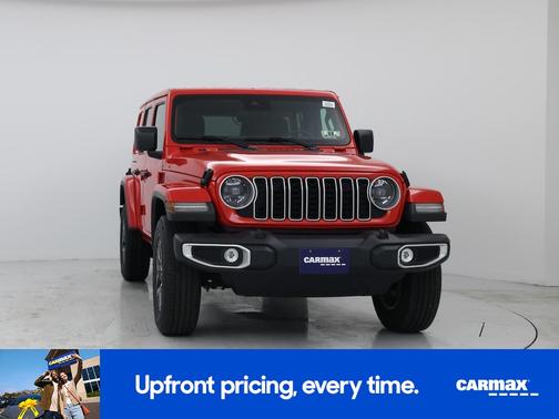 Red 2025 Jeep Wrangler Sahara