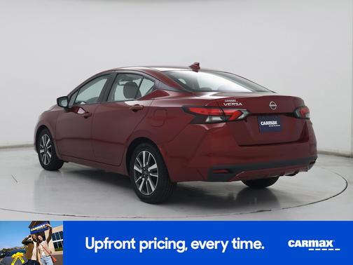 Red 2025 Nissan Versa SV