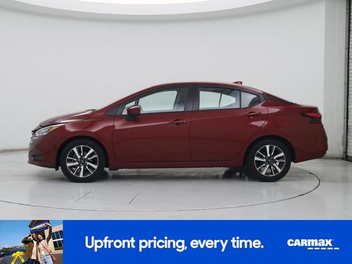 Red 2025 Nissan Versa SV