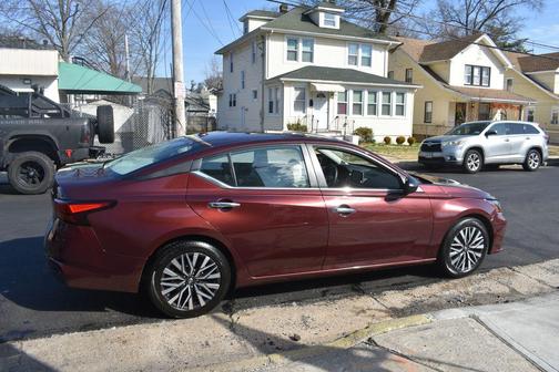 Garnet Pearl Metallic 2025 Nissan Altima 2.5 SV