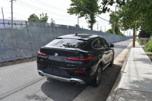 Black Sapphire Metallic 2024 BMW X4 xDrive30i