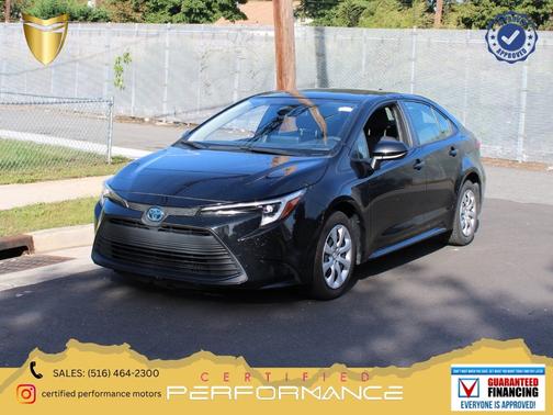 Midnight Black Metallic 2025 Toyota Corolla Hybrid LE