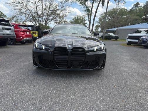 Black Sapphire Metallic 2025 BMW M4 Competition xDrive