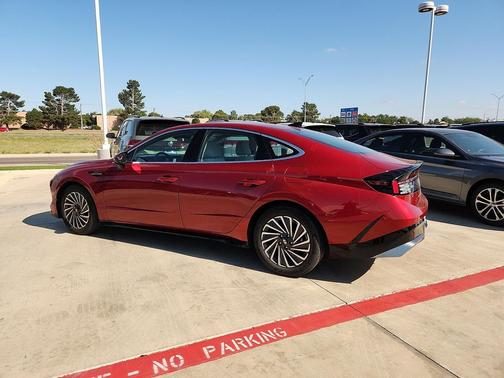 Ultimate red 2024 Hyundai SONATA Hybrid SE