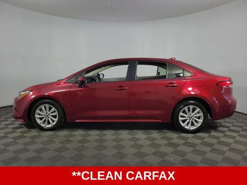 Ruby Flare Pearl 2025 Toyota Corolla Hybrid SE