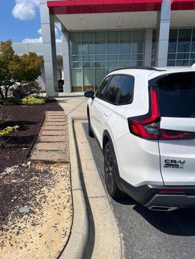 Platinum White Pearl 2026 Honda CR-V Hybrid Sport Touring AWD