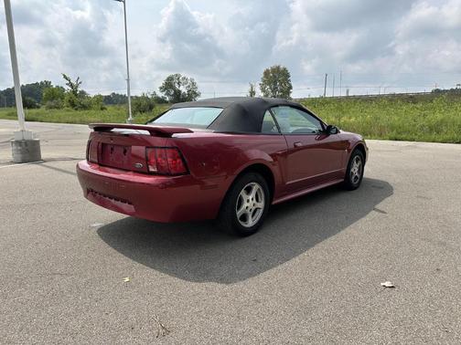 Red 2003 Ford Mustang Deluxe