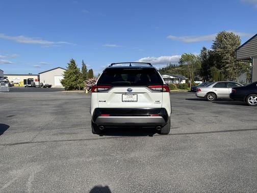 Blizzard Pearl/Midnight Black Metallic 2021 Toyota RAV4 Hybrid SE