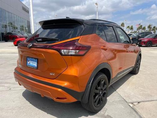 Monarch Orange / Super Black 2024 Nissan Kicks SR