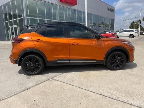 Monarch Orange / Super Black 2024 Nissan Kicks SR