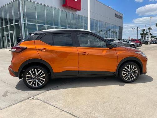Monarch Orange / Super Black 2024 Nissan Kicks SV