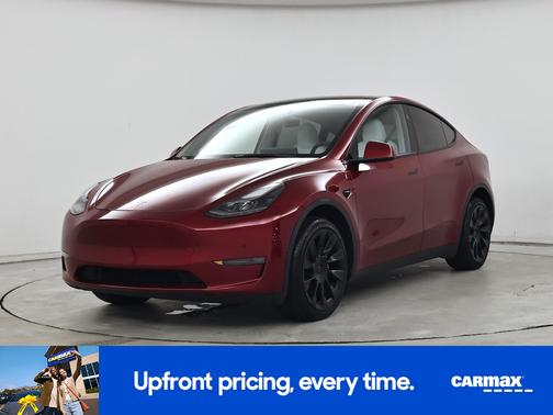 Red 2024 Tesla Model Y Long Range