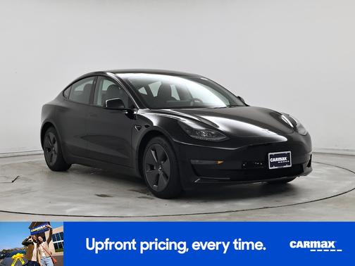 Black 2023 Tesla Model 3