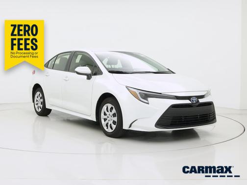 White 2025 Toyota Corolla Hybrid LE