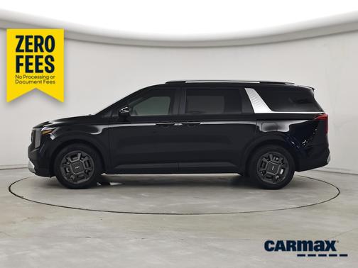 Black 2025 Kia Carnival Hybrid EX
