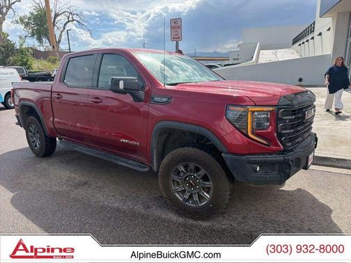 Volcanic Red Tintcoat 2024 GMC Sierra 1500 AT4X