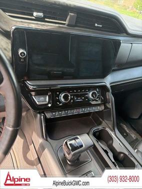 Volcanic Red Tintcoat 2024 GMC Sierra 1500 AT4X