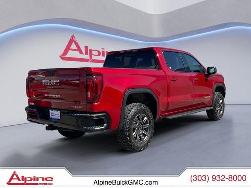 Volcanic Red Tintcoat 2024 GMC Sierra 1500 AT4X