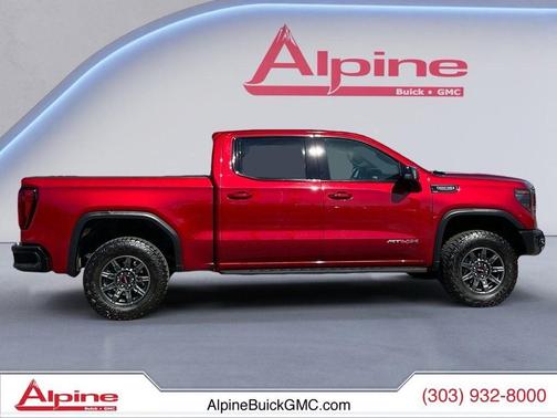 Volcanic Red Tintcoat 2024 GMC Sierra 1500 AT4X