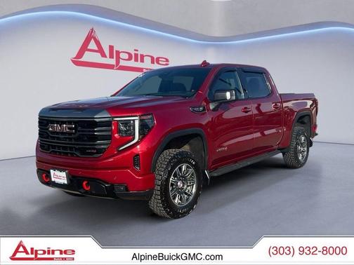 Volcanic Red Tintcoat 2024 GMC Sierra 1500 AT4