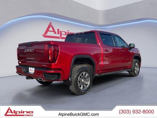 Volcanic Red Tintcoat 2024 GMC Sierra 1500 AT4